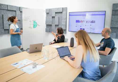 female presenting to her team