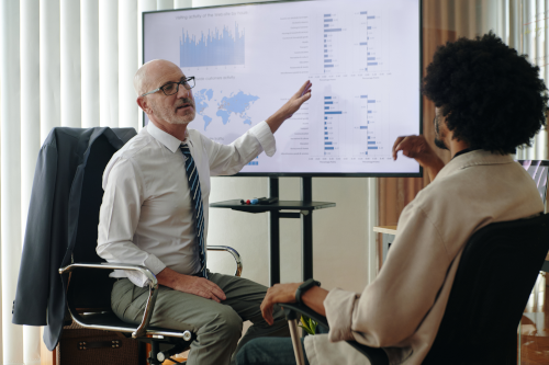 two male  doing chart analysis