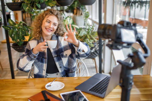 smiling woman blogger